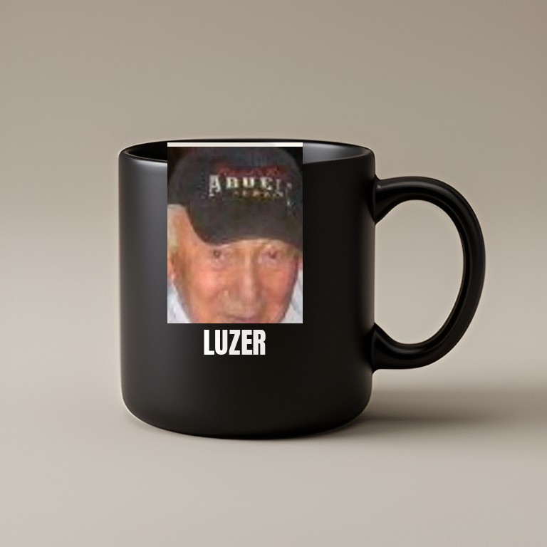 Black ceramic mug printed with Luzer's face and the word LUZER