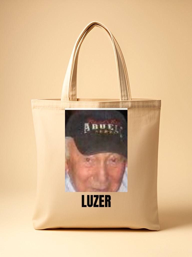 Canvas tote printed with Luzer's face and the word LUZER